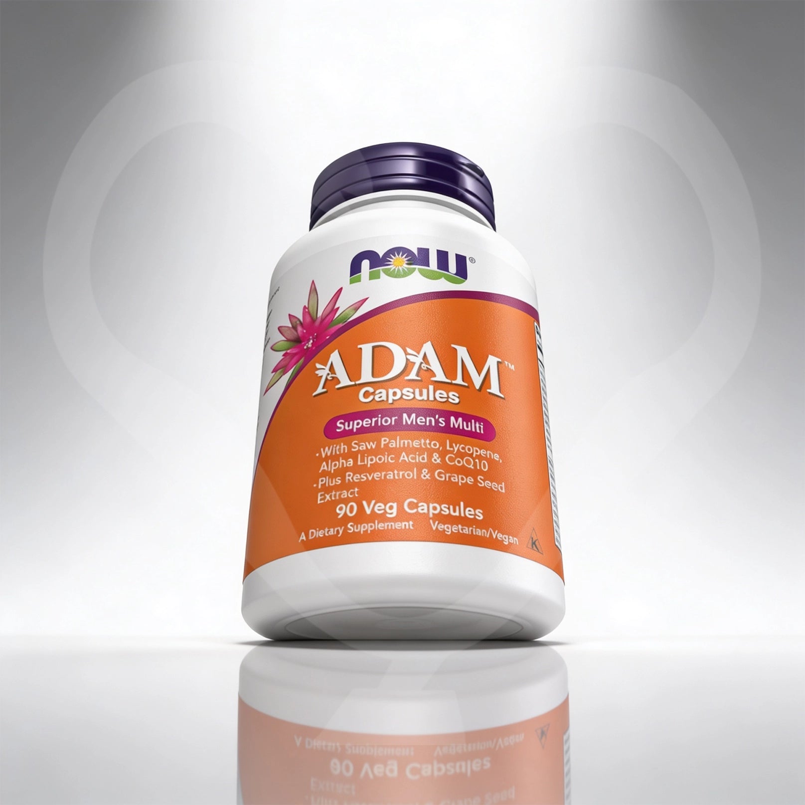 Supplement bottle labeled 'ADAM' on a reflective surface with a gray background