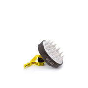 Pet grooming brush with yellow handle on a white background