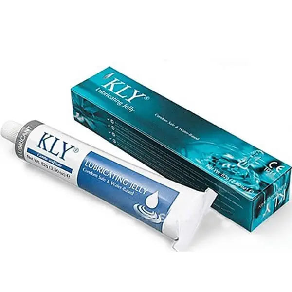 The image shows a box and tube of K L Y jelly lubricant, with predominantly blue and white colors and water droplet icons.