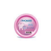 Pink container of Smokers tooth powder on a white background